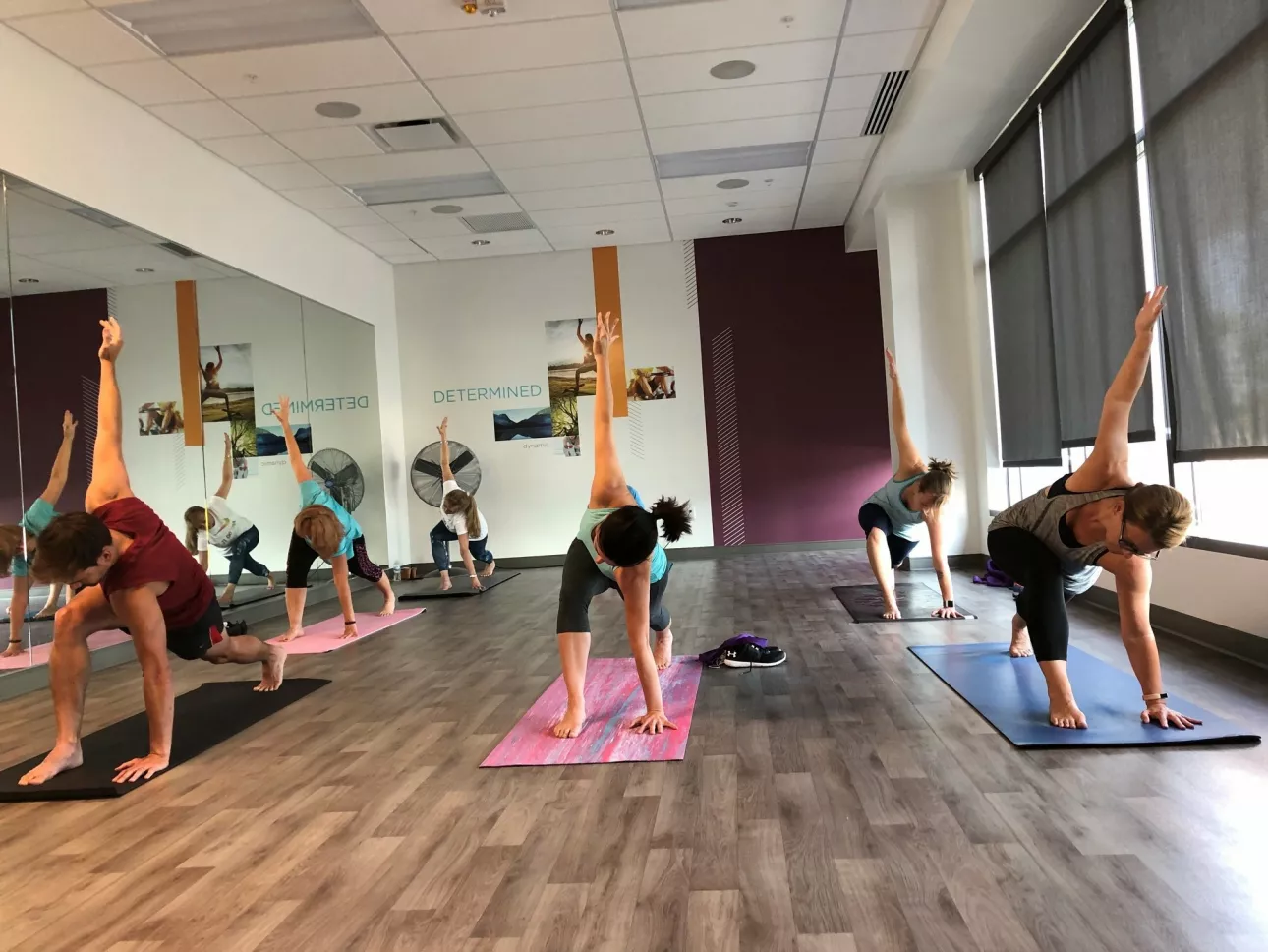 Bread Financial associates participate in a yoga class at the Easton office.