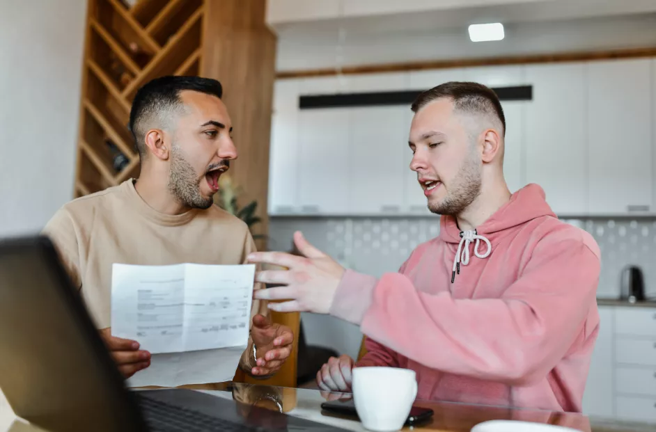 Males Having An Argument Over Increased Utility Bill