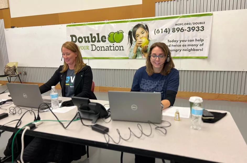 Bread Financial associates answer phones at the Mid-Ohio Food Collective.