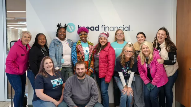 Bread Financial associates and members of the Ruling Our eXperiences team gather for a photo at Bread Financial's Columbus office.