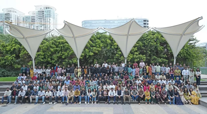 Group photo of Bread Financial associates in India celebrating the fifth anniversary of the Bangalore office opening.