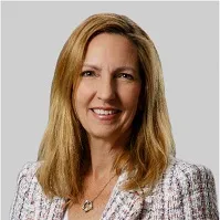 Headshot of Val Greer, Executive Vice President and Chief Commercial Officer