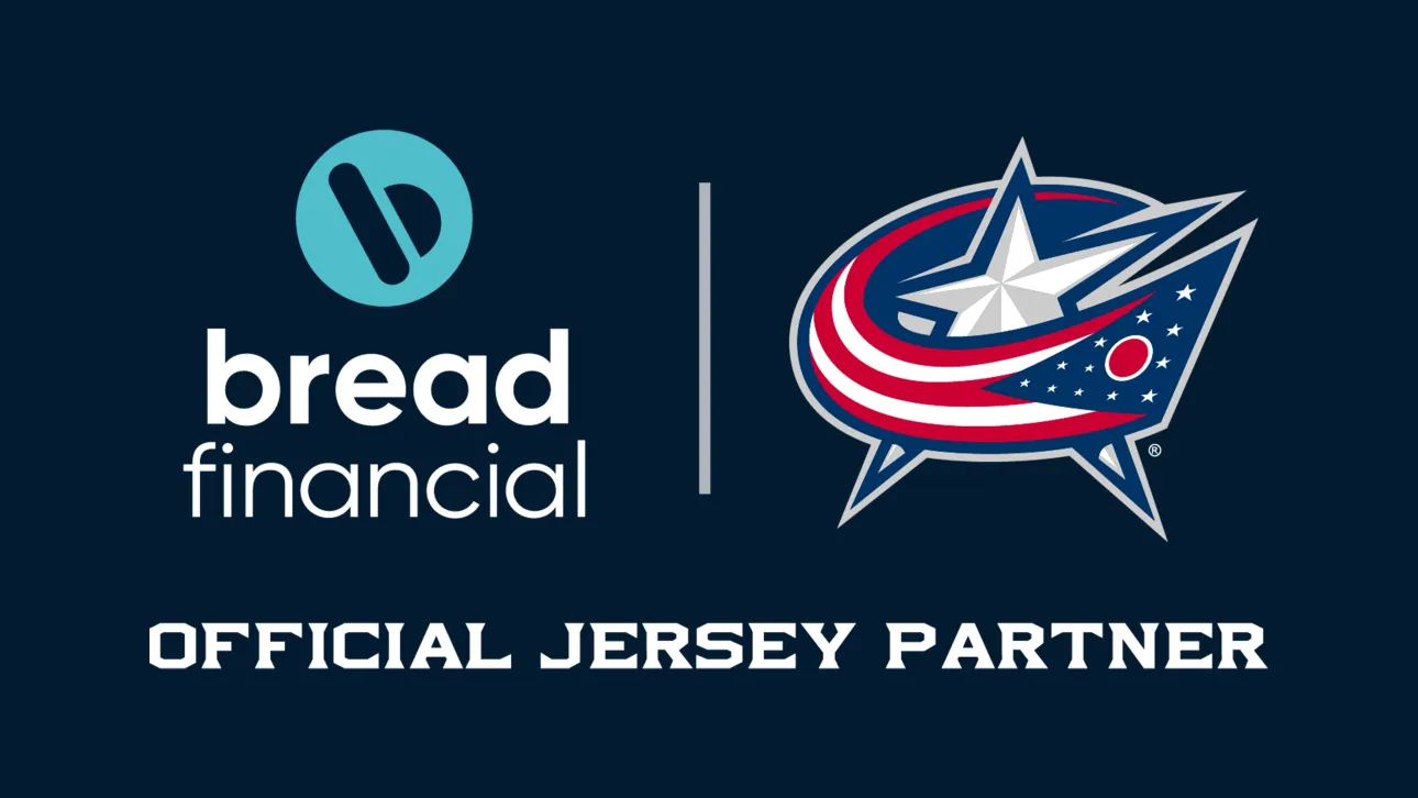 Bread Financial and Columbus Blue Jackets logos displayed side by side on a dark blue background, separated by a vertical line. Below the logos, the text reads "Official Jersey Partner," announcing Bread Financial as the Blue Jackets' official jersey partner.