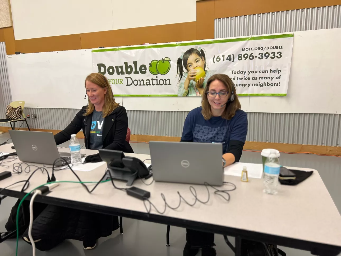 Bread Financial associates answer phones at the Mid-Ohio Food Collective.